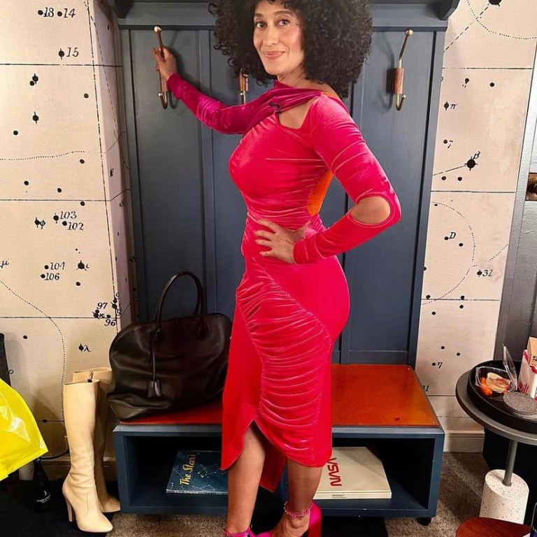 Tracee Ellis Ross Appears on the Tonight Show Wearing a Preen By Thornton Bregazzi Pink Cut Out Velvet Dress And Versace Platform Pumps