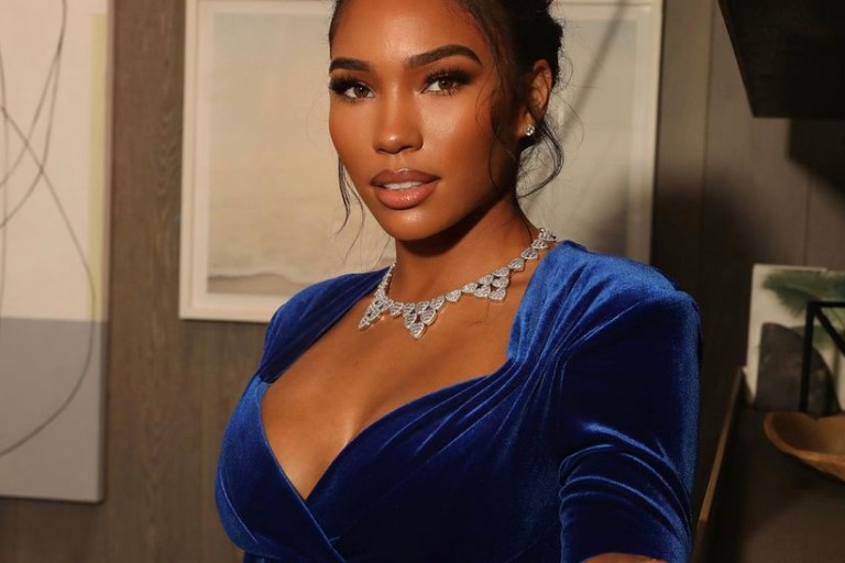 Cuban Link Attends the Powerbook Force Premiere with 50 Cent in a Blue Velvet Miss Circle Dress