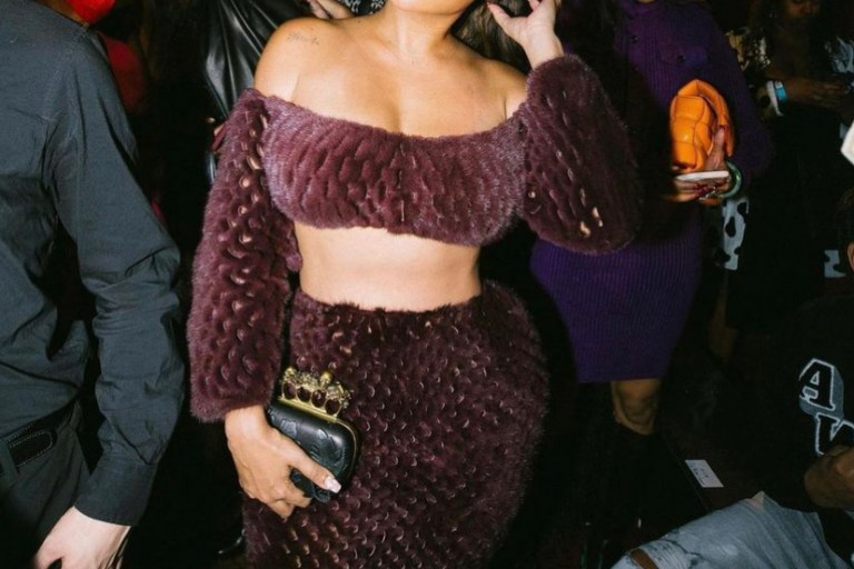 Lala Attends the Laquan Smith FW22 Show Wearing the Brand’s FW21 Plum Laser Cut Mink Two Piece Set