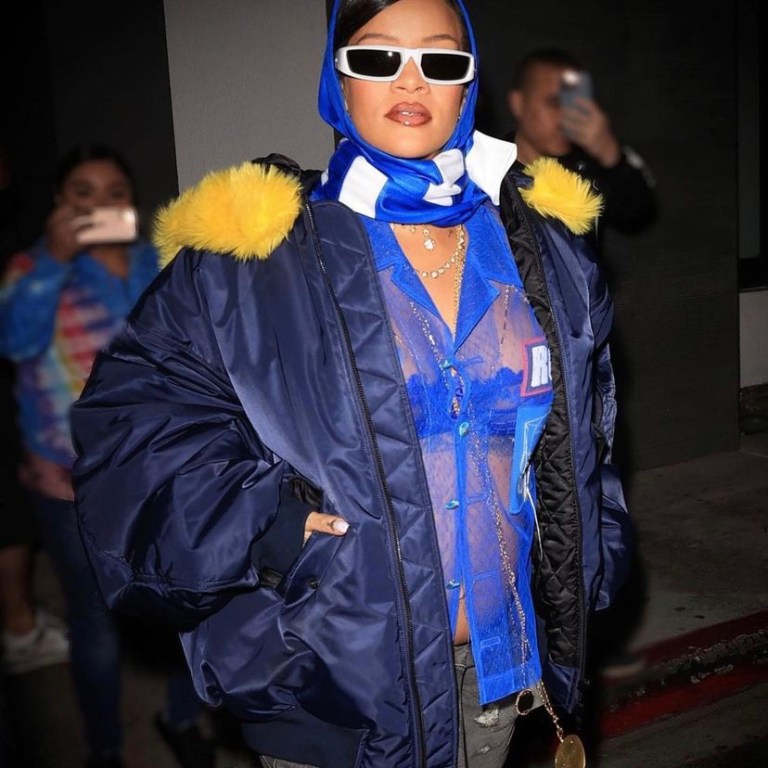 Rihanna Attends the Super Bowl in a $2,990 Navy Blue Balenciaga Day Yellow Fur Trimmed Jacket In Los Angeles
