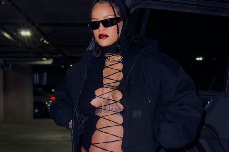 Rihanna Shows Off Her Baby Bump in Balenciaga Wrap Sunglasses, Black Lace up Jean Paul Gaultier Top, Carhartt Jacket, and The Attico Jamie Stirrup Leggings