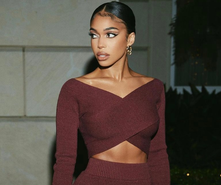 Lori Harvey Attended a Burberry Take Over Event Wearing a Burberry Maroon Burgundy Knit Crop Top and Skirt Set