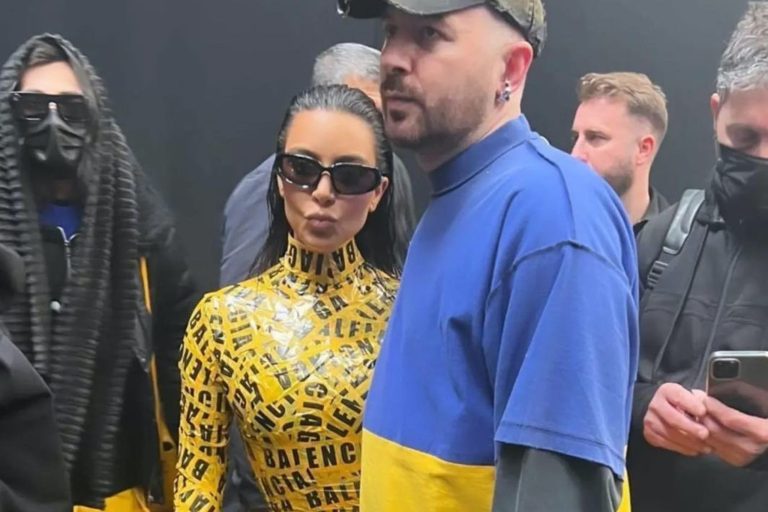 Kim Kardashian Set Internet Ablaze with Balenciaga Yellow Caution Tape Look + Receives Many ‘Knock Off’ Accusations