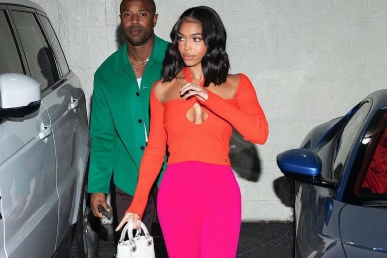 Lori Harvey Steps out with Boyfriend Michael B. Jordan wearing a Orange Attico Mali top and Pink Attico Jamie Leggings
