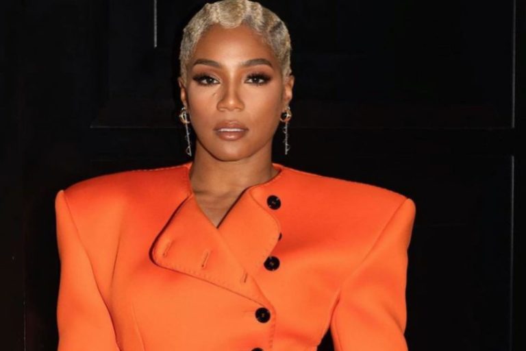 Tiffany Haddish attends Grammys Afterparty in Custom Orange and Black Dolce Gabbana Dress