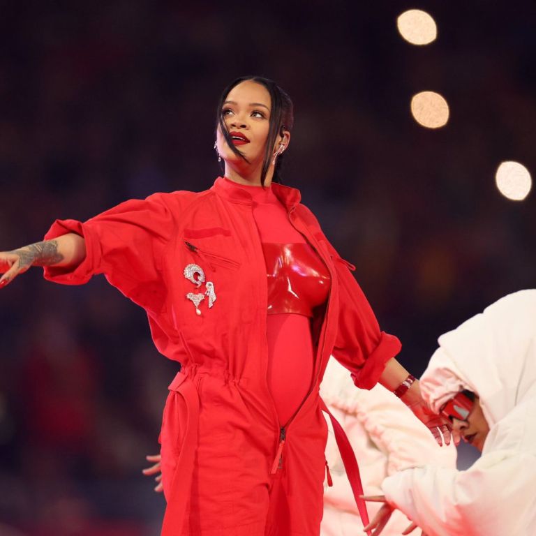 Rihanna Announces Baby #2 + Looks Red Hot in Custom Loewe, Alaia, and Salomon x Margiela Sneakers at Her SuperBowl 2023 Performance!