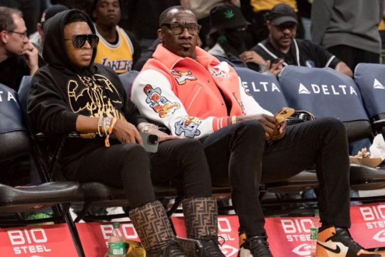 Shannon Sharpe Sits Courtside in a Louis Vuitton Varsity Jacket