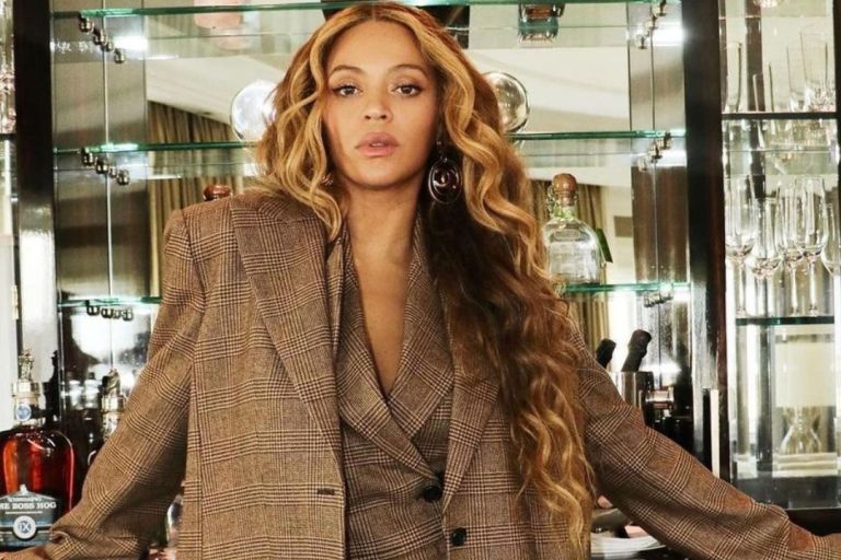 Beyoncé Takes On London in a Brown Plaid Michael Kors Suit with Nude Louboutin Pumps