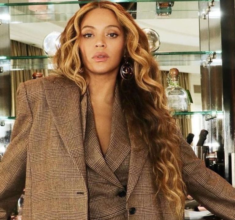 Beyoncé Takes On London in a Brown Plaid Michael Kors Suit with Nude Louboutin Pumps