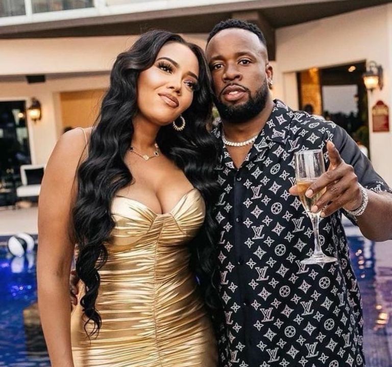 Fashion Bomb Couples: Angela Simmons Wore a Gold Alex Perry Dress and Alaia Heels While Celebrating Yo Gotti in a full Louis Vuitton Look