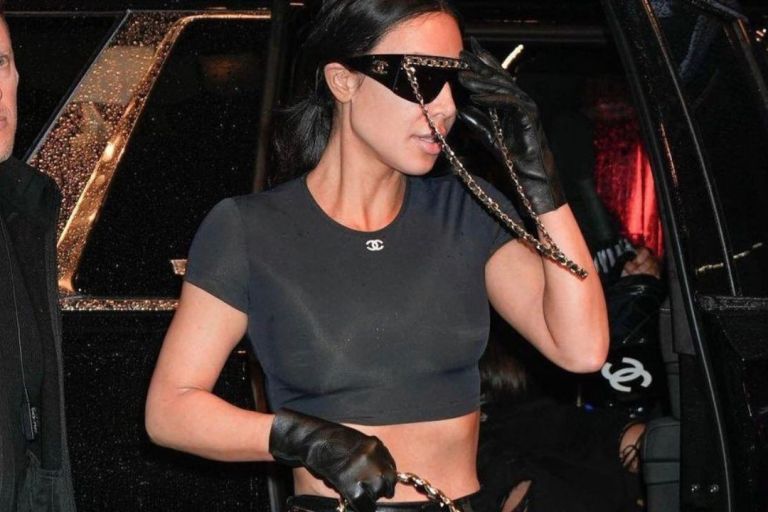 Kim Kardashian Wore a Black Chanel Crop Top,  Leather Pants and Quilted bag as she Arrived to New York for the MET Gala
