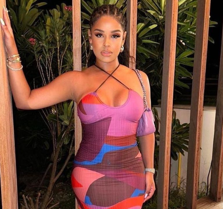 You Ask? We Answer! Taina Williams Wore a Multicolor Pretty Little Thing Dress While on Vacation