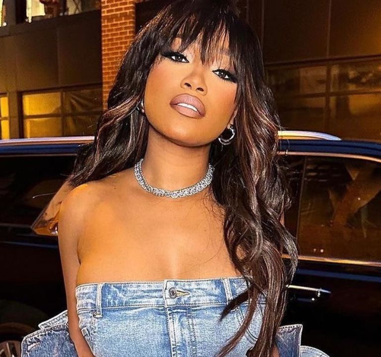 KeKe Palmer Posed in a Denim on Denim Look Including a $309 Moschino Dress and a $795 Jacket