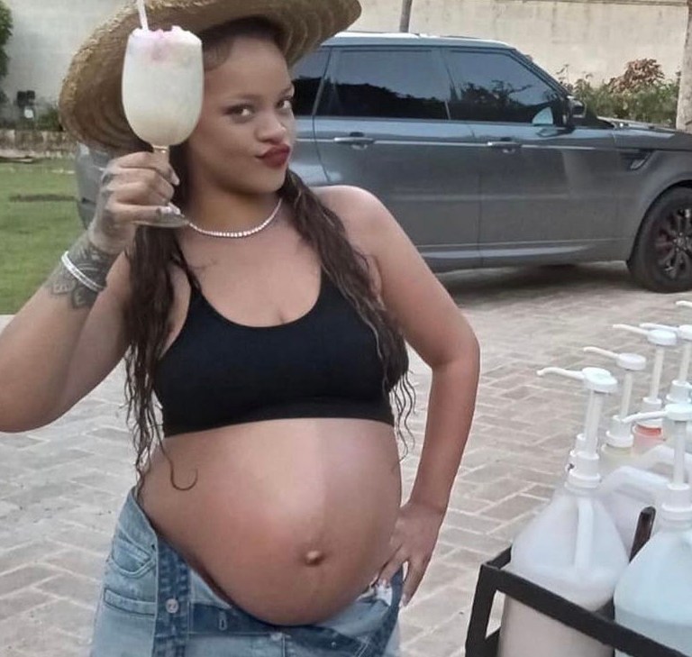 Rihanna Flaunted Her Baby Bump in Barbados Wearing a Denim Courrèges Skirt and Ruslan Baginskiy Straw Hat