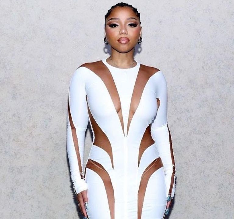 Chloe Bailey Attended the Hall of Fame Induction for Dwayne Wade in a $2,010 White Mugler Spiral Illusion Dress