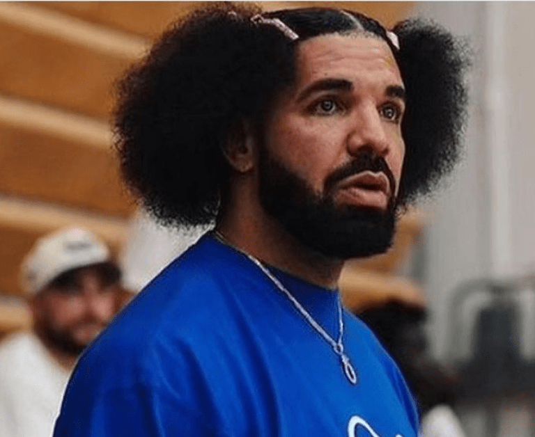 Drake’s Debuts New Hairstyle and a Vintage Fubu Shirt