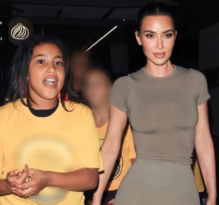 Kim Kardashian Sported an Army Green Skims Look with Yeezy Slides and a $24K Hermes Crocodile Kelly handbag at North’s Basketball Game (Shop the look!)
