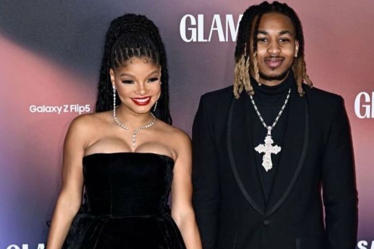 Fashion Bomb Couple: Halle Bailey Posed with her Beau DDG in a Black and White NICOLE + FELICIA Couture Dress to the Glamour Women of the Year Awards