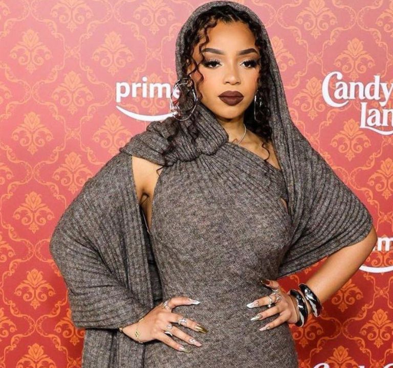 Chloe Bailey Wore a Heather Grey $450 Kwame Adusei Dress to the World Premiere of Amazon Prime’s “Candy Cane Lane”