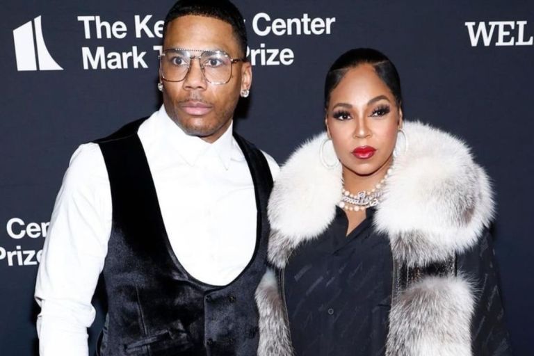 Fashion Bomb Couple: Ashanti Attends the Mark Twain Prize Red Carpet with Nelly in a Black Balenciaga Dress and Daniels Leather Mink Coat