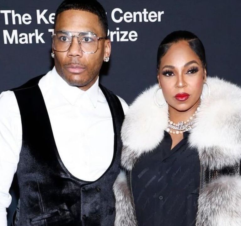 Fashion Bomb Couple: Ashanti Attends the Mark Twain Prize Red Carpet with Nelly in a Black Balenciaga Dress and Daniels Leather Mink Coat