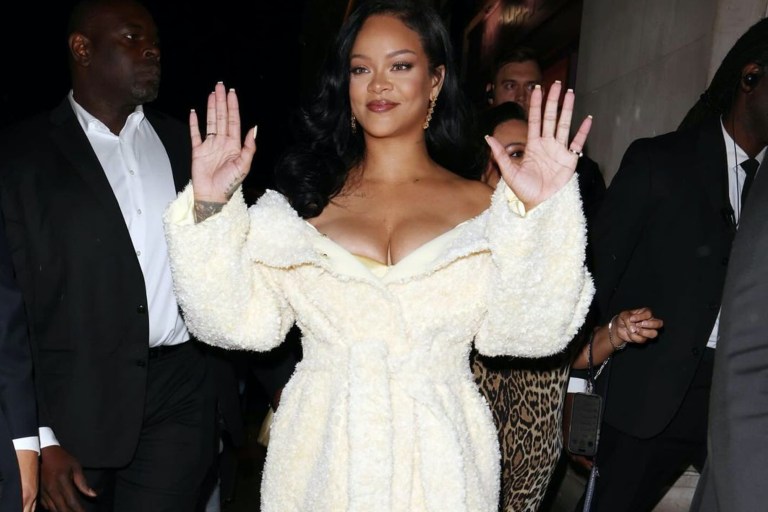 Rihanna Launches Fenty Hair in London in a Jacquemus Cream Coat, John Galliano SS 06 Ruffle Dress and Gold Custom Amina Muaddi Heels