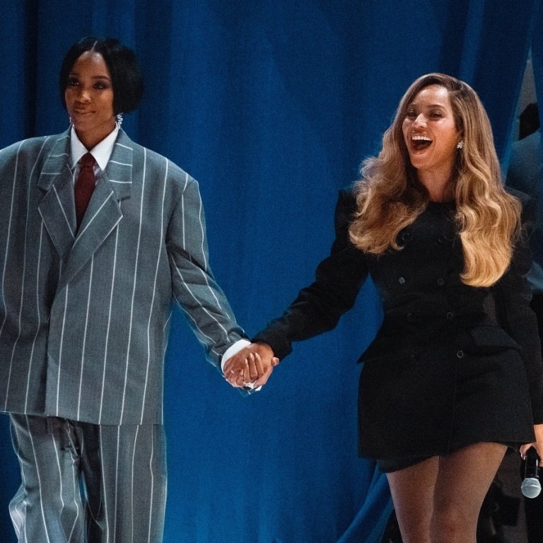 Beyonce and Kelly Rowland Campaign for Kamala Harris in Houston, with Beyonce in a Black Wardrobe NYC Blazer Dress and Kelly in a Fear of God Gray and White Striped Suit