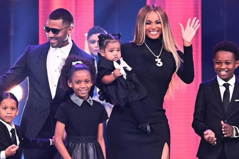 Ciara Wore A Black Balenciaga Dress with Black Aminah Jillil Boots Alongside Family at the Steelers Fashion Show