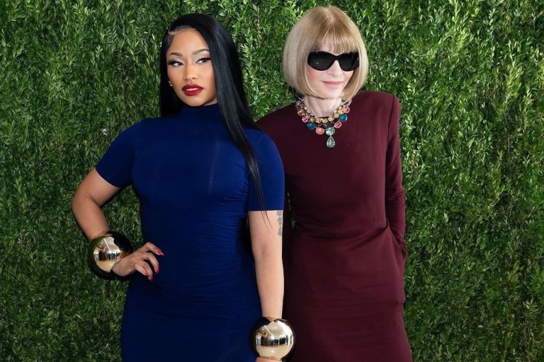 Nicki Minaj Attends Vogue’s Forces of Fashion Event in a Navy Alaia Dress and Schiaparelli Coat