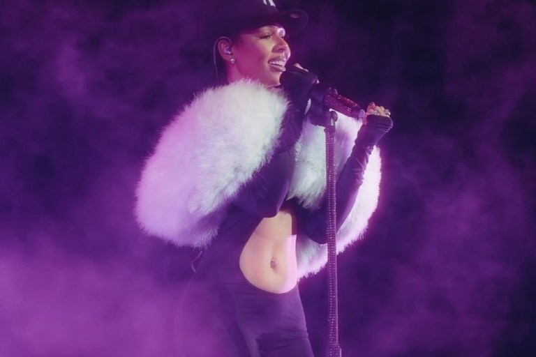 Mariah the Scientist Celebrates Young Thug’s Release at a Concert Wearing a $1,020 Bois Camp Cut Out Catsuit and Faux Fur Stole