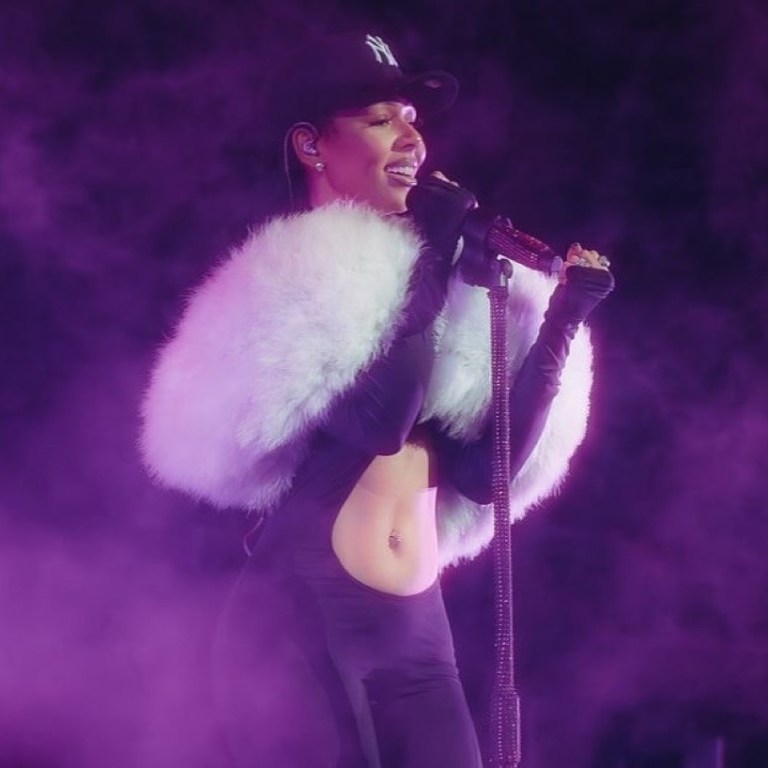 Mariah the Scientist Celebrates Young Thug’s Release at a Concert Wearing a $1,020 Bois Camp Cut Out Catsuit and Faux Fur Stole