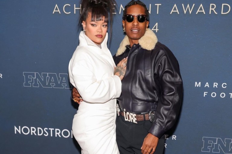 Rihanna and ASAP Rocky Attend the Footwear News Awards in a Custom White Alaia Gown + a Black Leather Phoebe Philo Coat