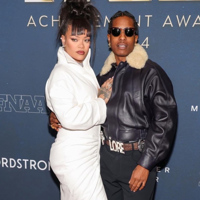 Rihanna and ASAP Rocky Attend the Footwear News Awards in a Custom White Alaia Gown + a Black Leather Phoebe Philo Coat