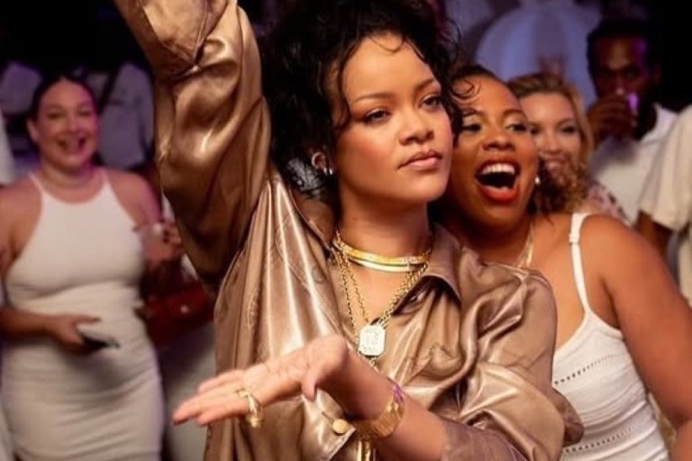 Rihanna Attends Her Brother’s Gender Reveal in an Alexander Wang Gold Trompe L’Oeil Metallic Workwear Shirt and Matching Pants