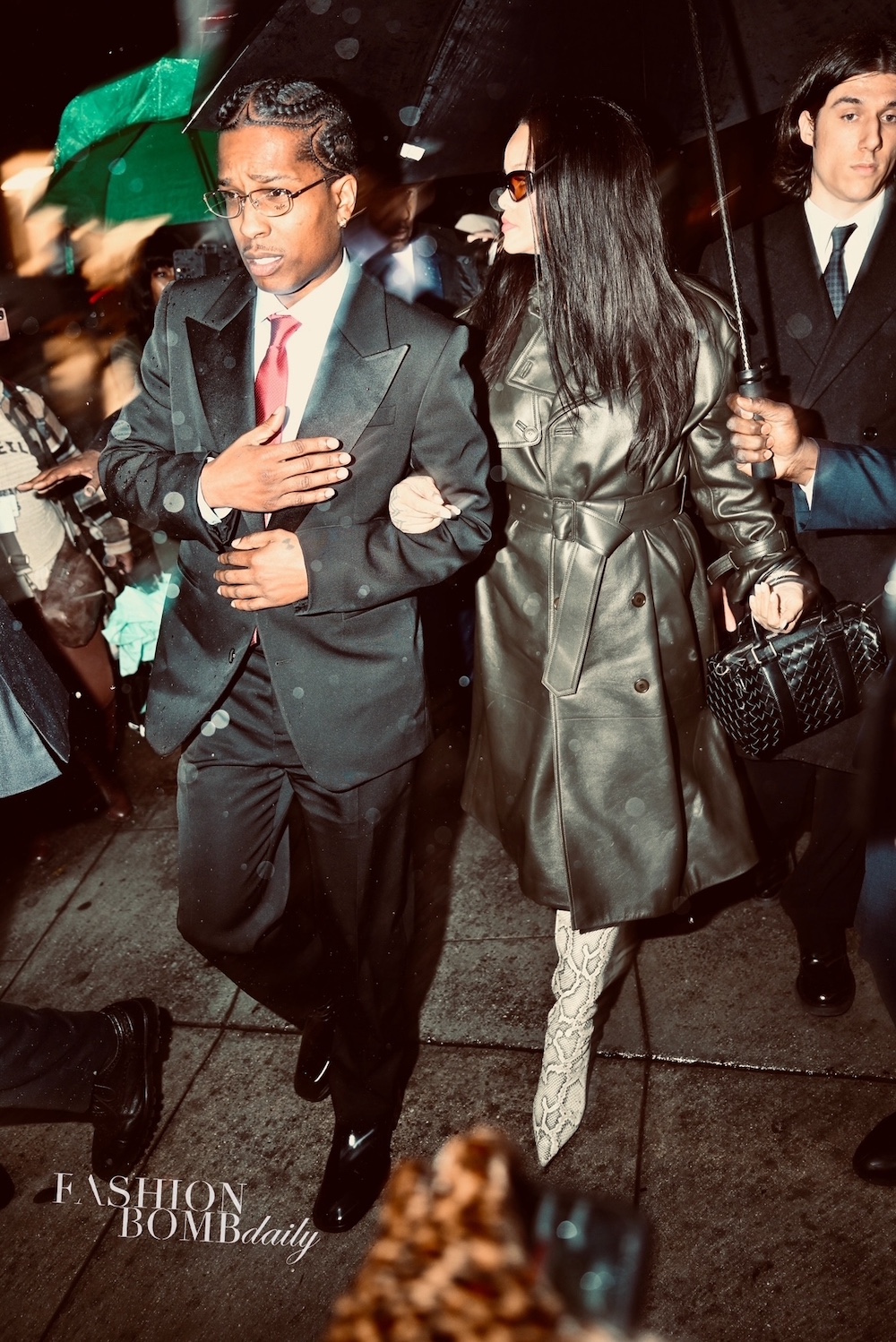 0909 Rihanna And Son RZA Support ASAP Rocky In Court With Rihanna In A Phoebe Philo Green Leather Jacket Amina Muaddi Snake Boots And A Bottega Veneta Bag