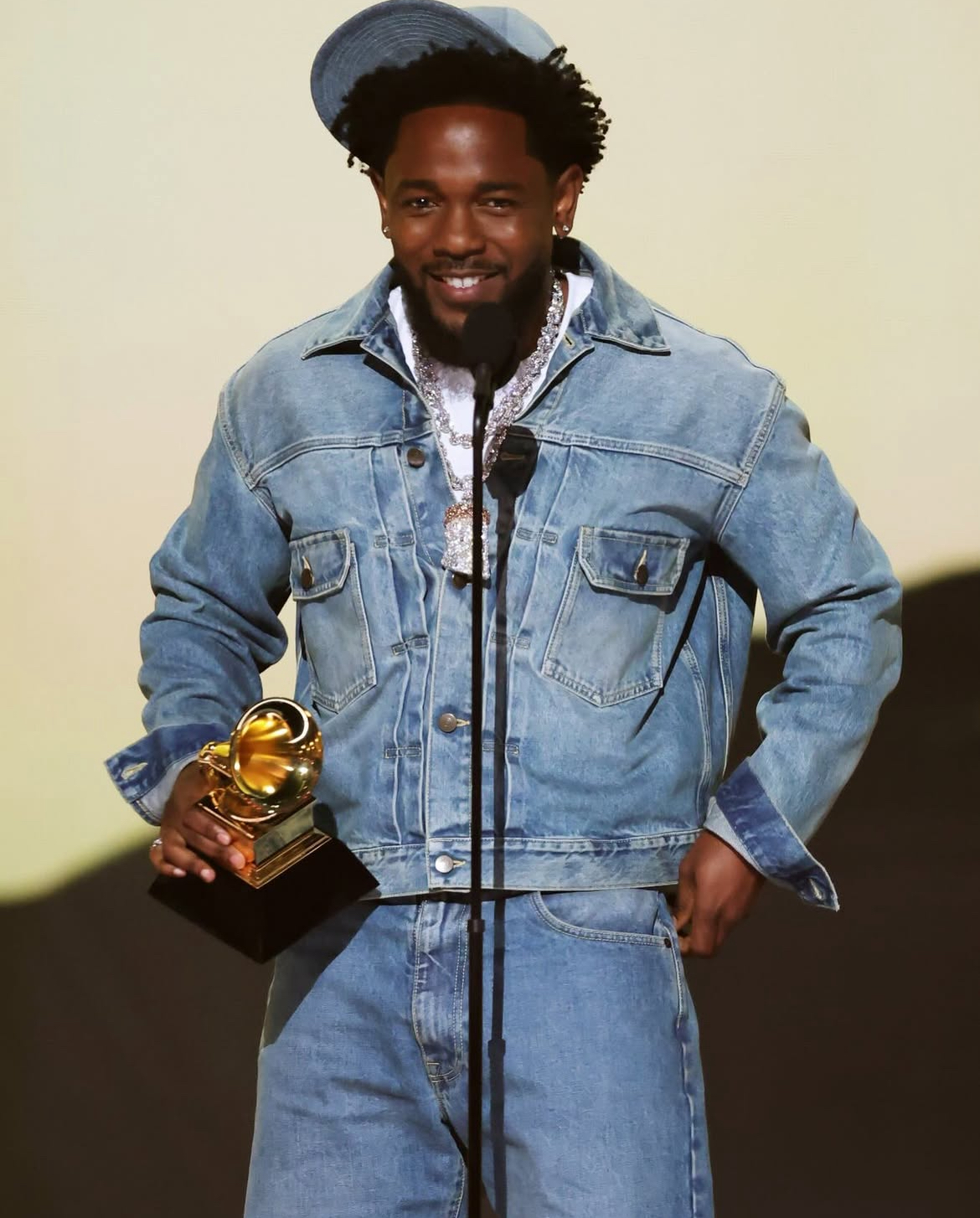 Top 10 Best Dress Celebrities At The 20205 Grammys Beyonce Wins Best Album In A Gold Schiaparelli Dress Cardi B Dazzles In A Multicolor Roberto Cavalli Feather Gown 25