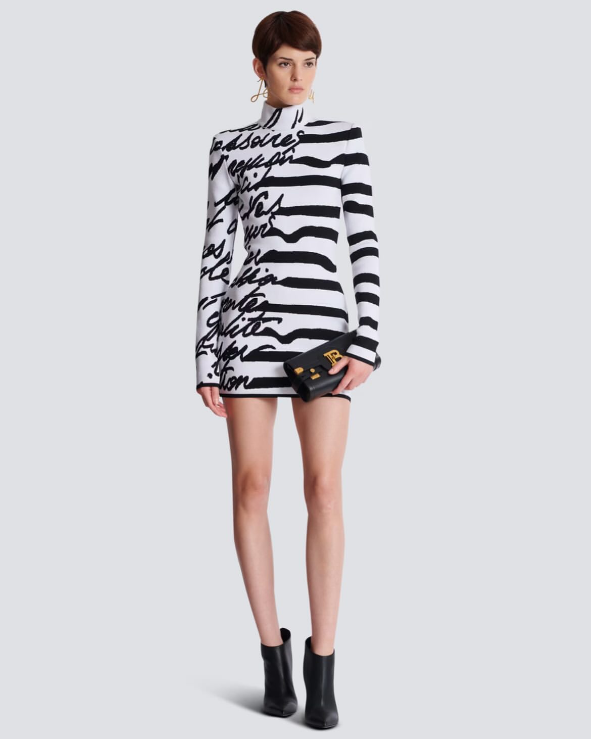 You Ask We Answer Ashanti Posed For The Gram In A Black And White Balmain Dress 2