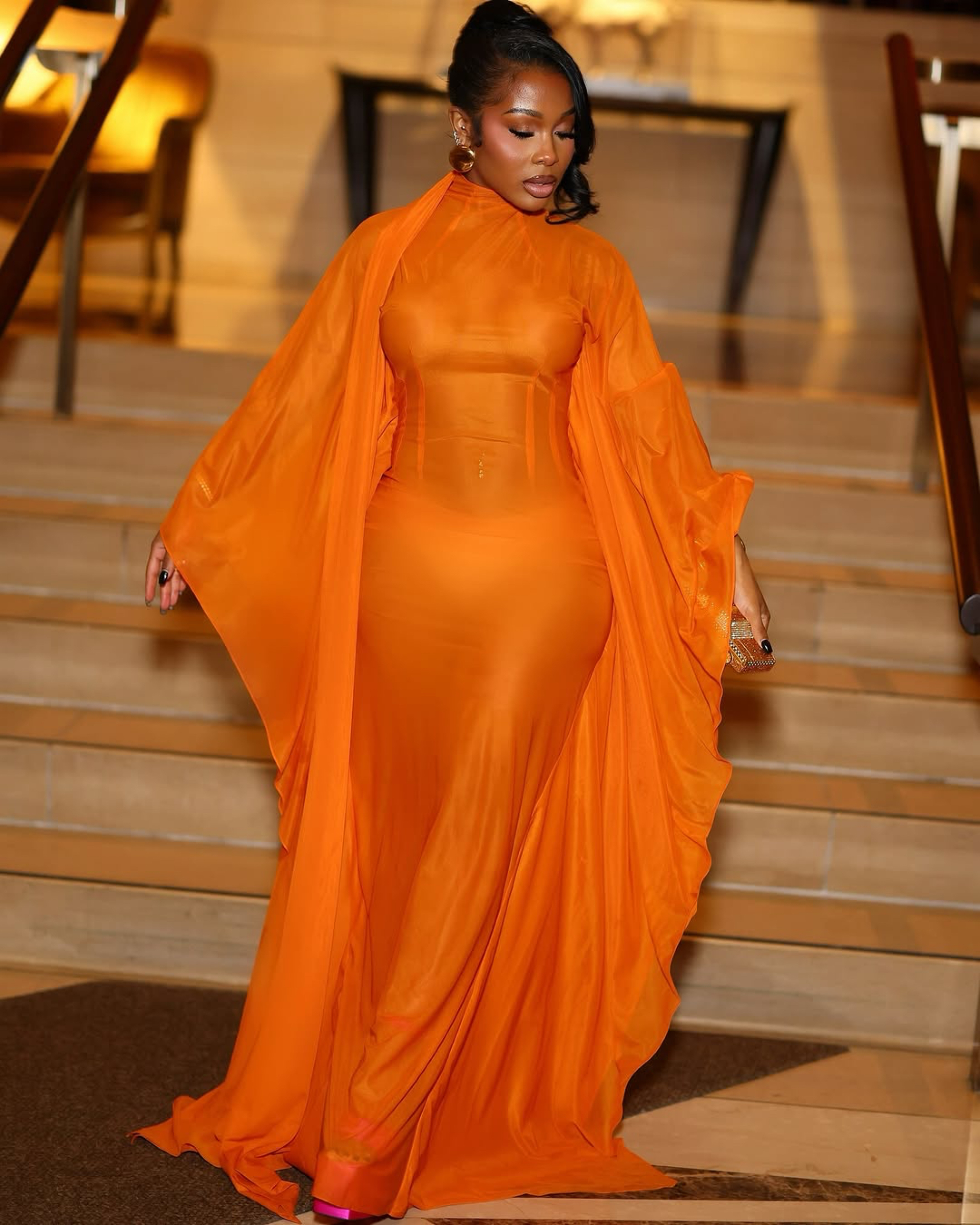 10 Jayda Cheaves Wears Laquan Smith Orange Gown And Brandon Blackwood Bomb Accessories To The Black Arts Council Benefit