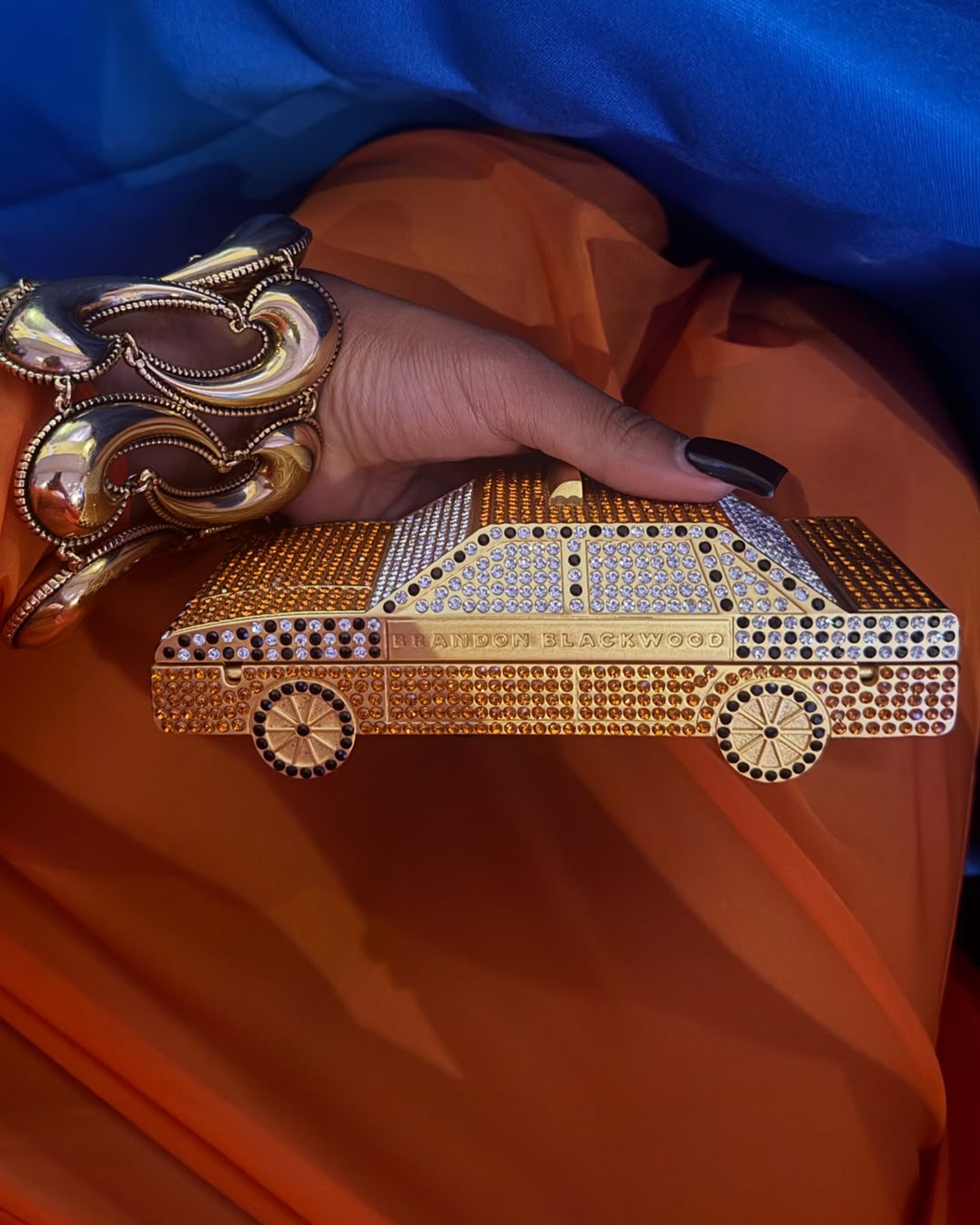 3 Jayda Cheaves Wears Laquan Smith Orange Gown And Brandon Blackwood Bomb Accessories To The Black Arts Council Benefit