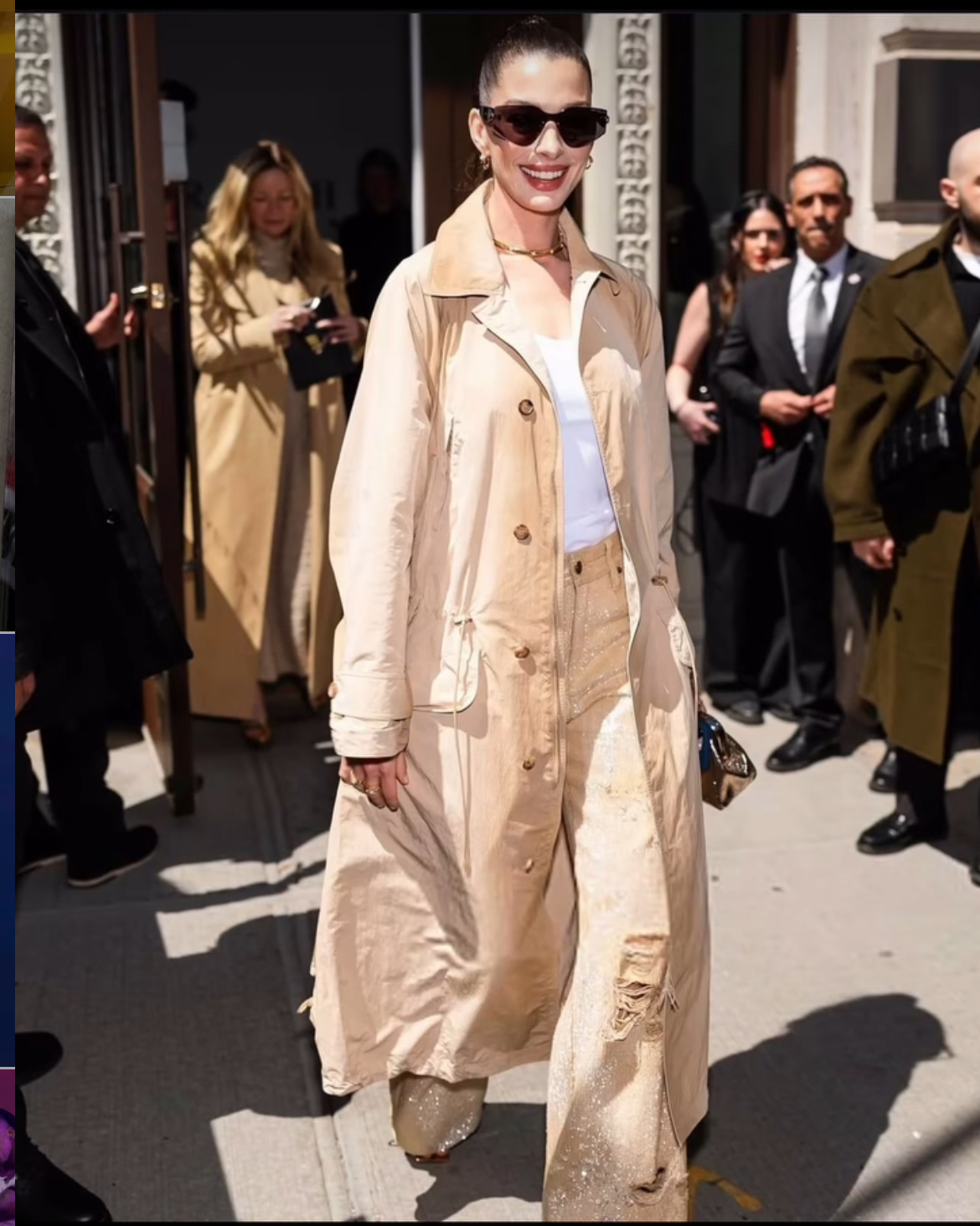 Anne Hathaway Attended The Ralph Lauren FW 25 Show In A Khaki Trench Coat And Sequins Embellished Jeans 1