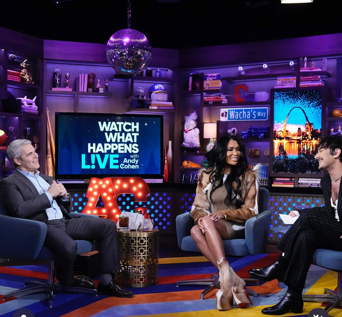 Brit Eady Appeared On WWHL In A Brown Vintage Roberto Cavalli Dress With A Dior Handbag And Christian Louboutin Boots 4