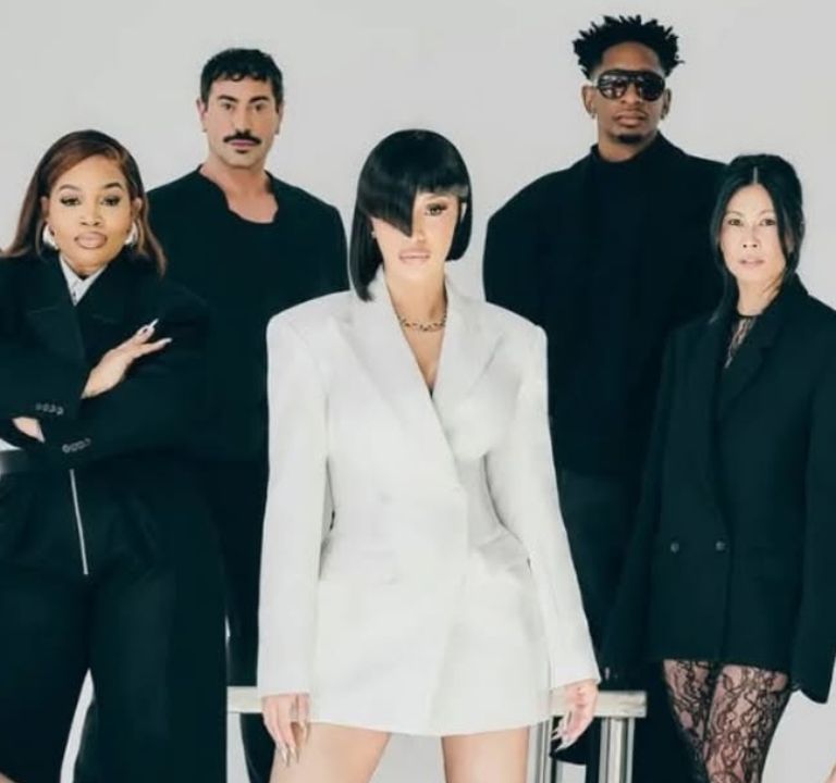 Fashion News: Cardi B Announces Joint Venture with Revolve Group in a White Double Breasted Blazer Dress