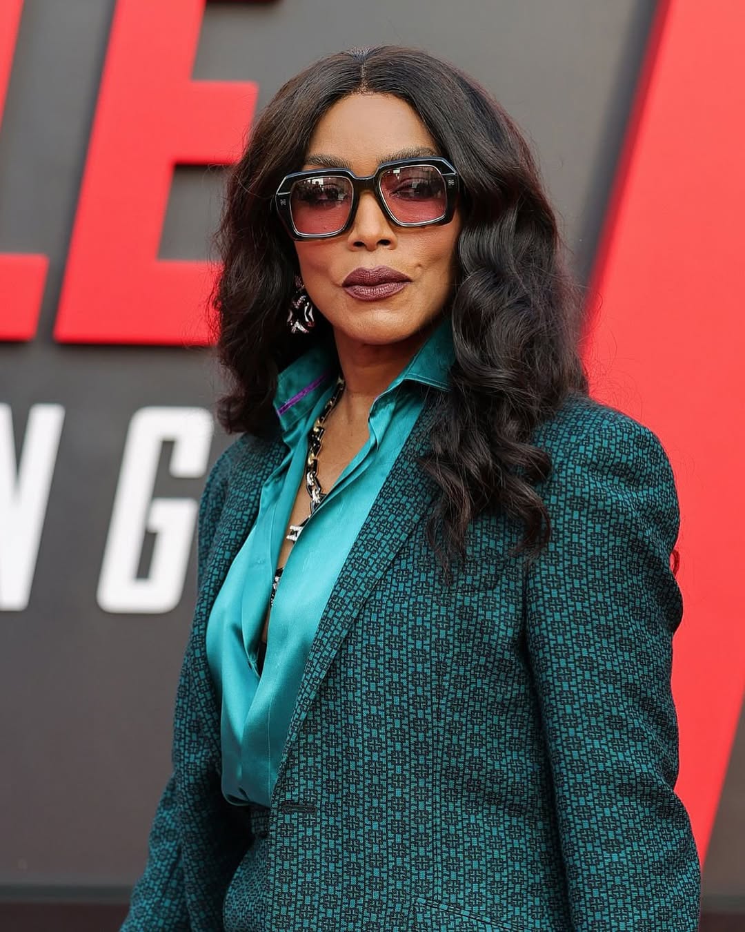 2 Angela Bassett Wears Ozwald Boateng Green Suit To The Mission Impossible  The Final Reckoning Premiere