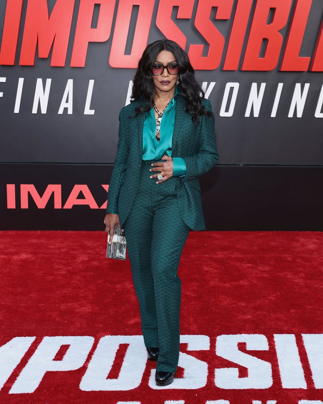 Angela Bassett Wears Ozwald Boateng Green Suit To The Mission Impossible  The Final Reckoning Premiere