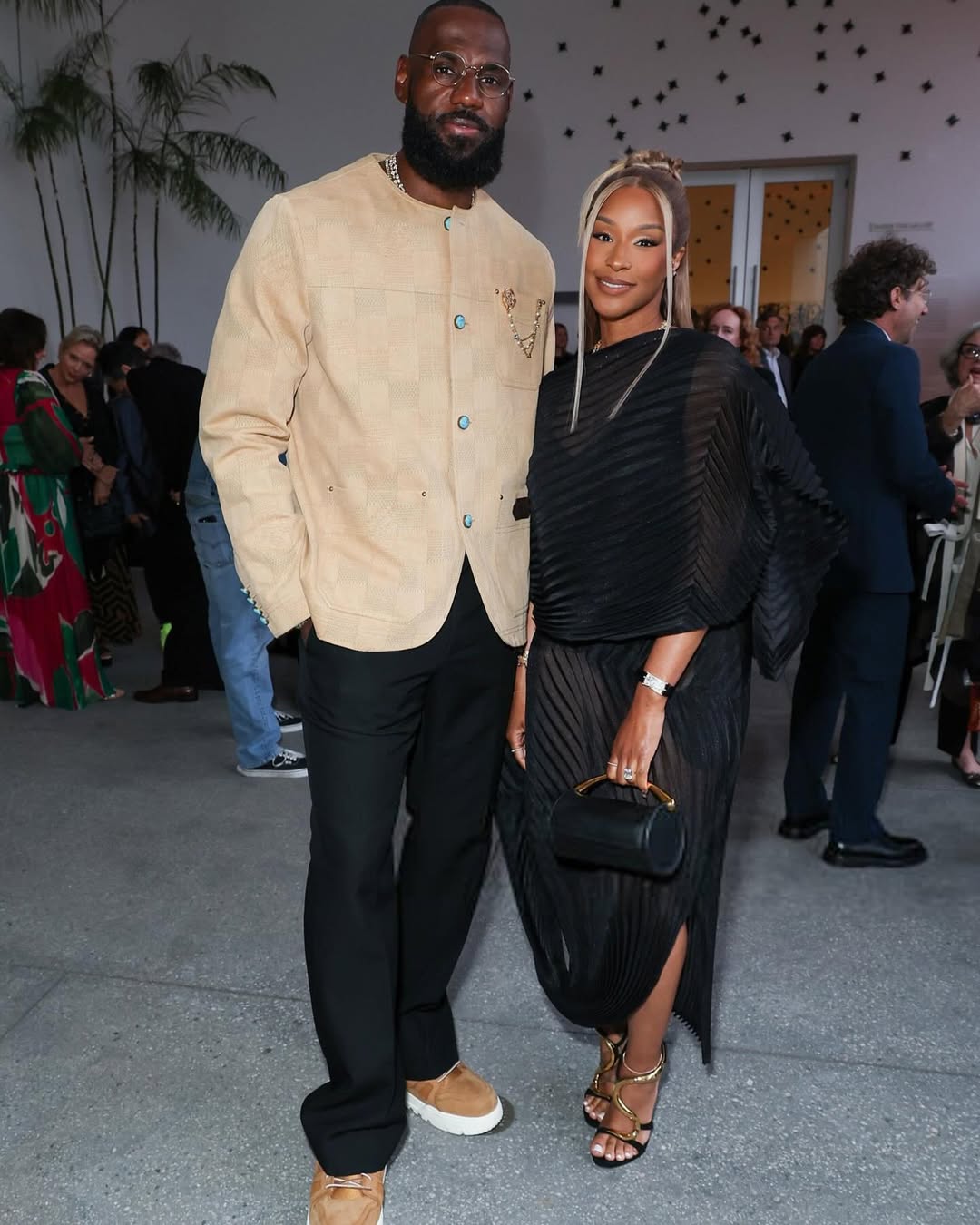LeBron James In Louis Vuitton And Savannah James In Issey Miyake At The Hammer Museum Gala