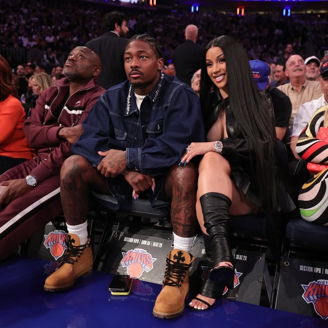New Fashion Bomb Couple Cardi B And Stefon Diggs Sit Courtside With Cardi In A Leather Miu Miu Shirt And Skirt Set And Stefon In Simone Rocha Embellished Denim Image 1747103521 1