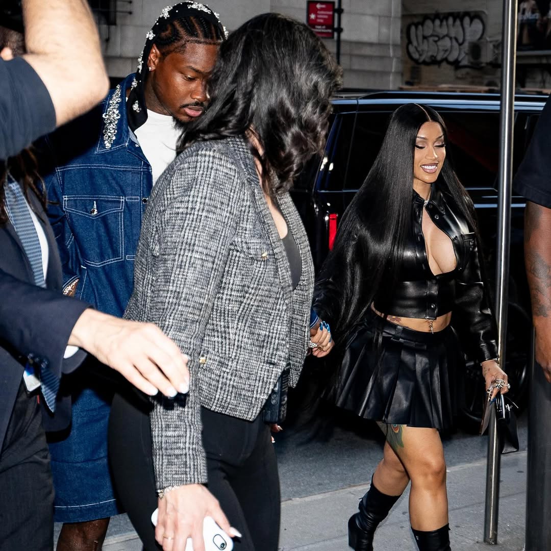 New Fashion Bomb Couple Cardi B And Stefon Diggs Sit Courtside With Cardi In A Leather Miu Miu Shirt And Skirt Set And Stefon In Simone Rocha Embellished Denim