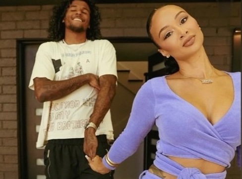 Draya Answers Gen Z Questions with Jalen Green in Maisie Wilen Purple Terry Cloth Wrap Cardigan and Leggings Set