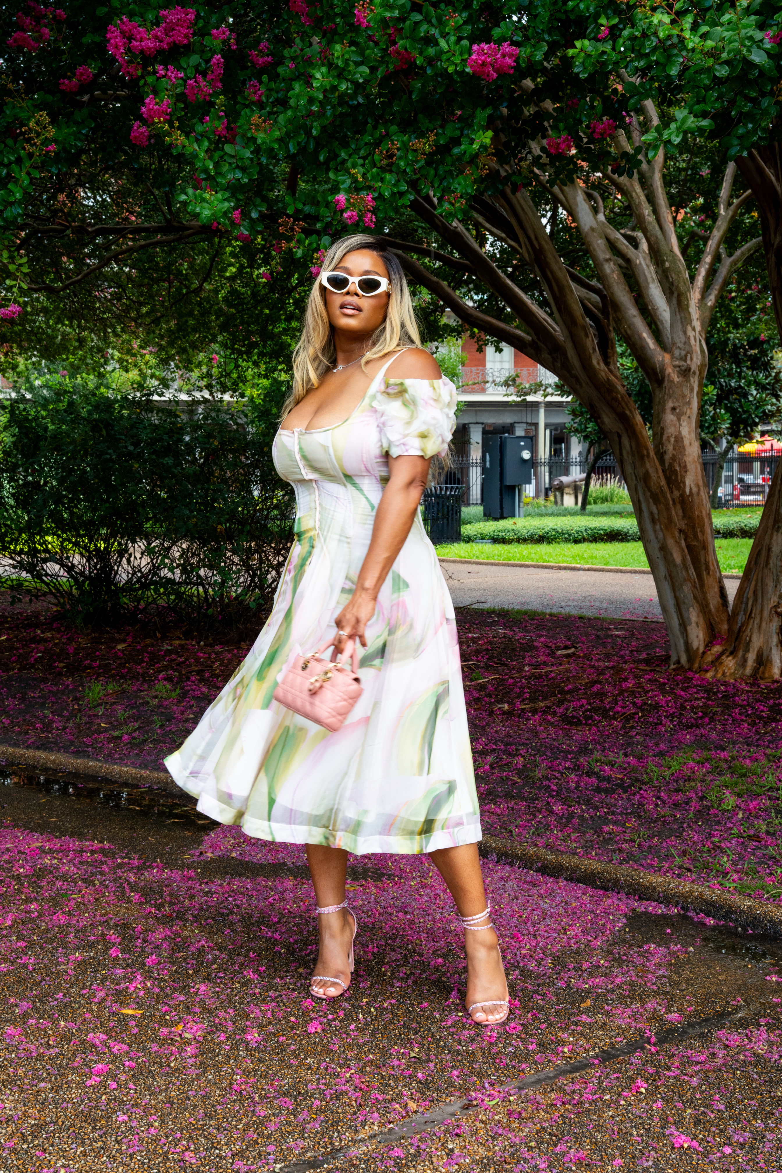 Fashion Bomb CEO Claire Sulmers Stuns In A White Floral Spero Sur Mer Dress During Essence Fest 2