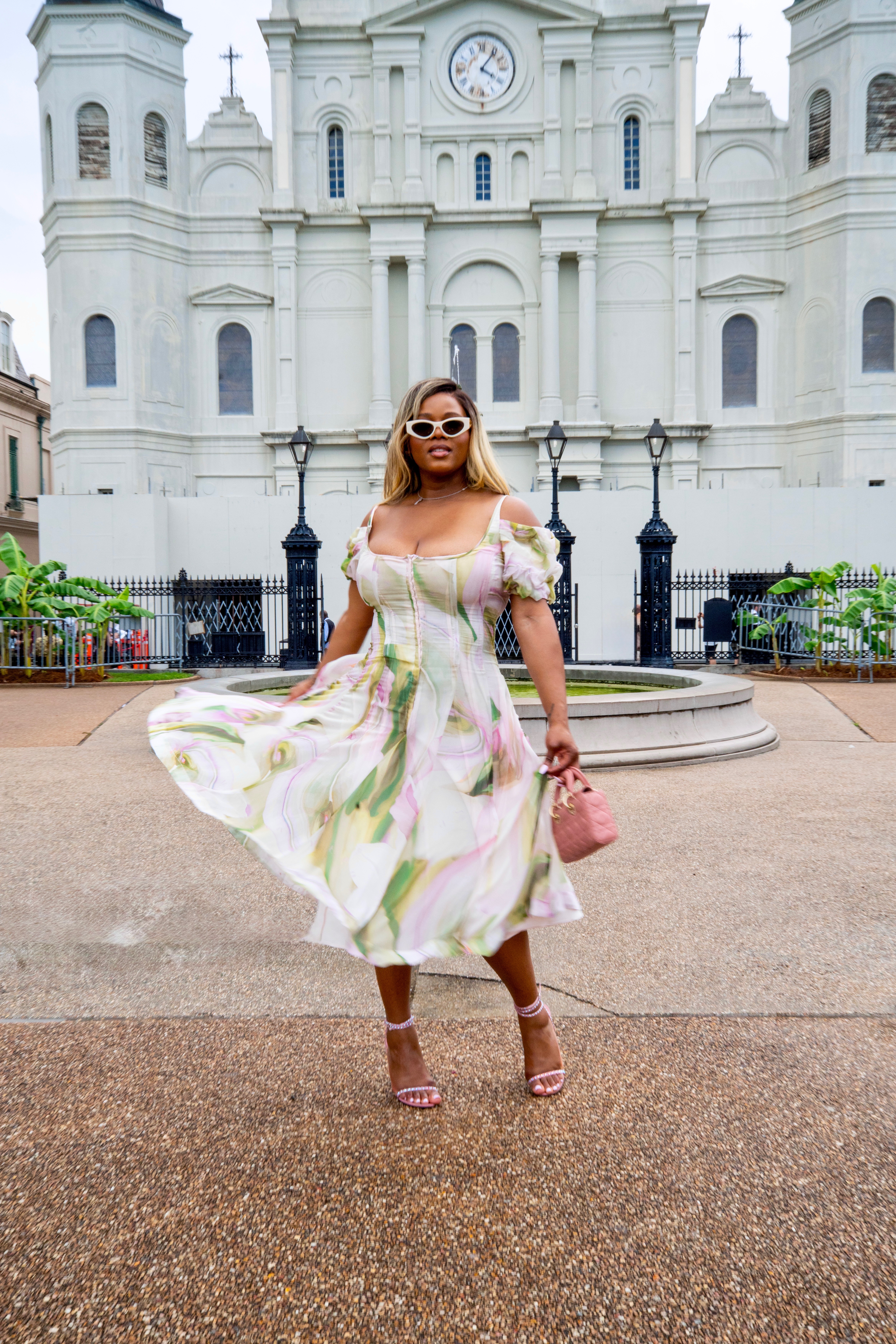 Fashion Bomb CEO Claire Sulmers Stuns In A White Floral Spero Sur Mer Dress During Essence Fest 3